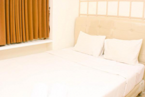 Homey and Nice 2BR at Meikarta Apartment By Travelio